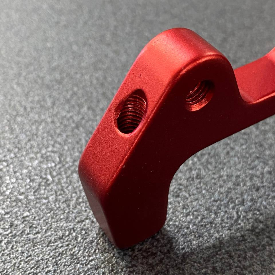 Supporto pinza freno posteriore per e-bike Fantic anodizzato rosso