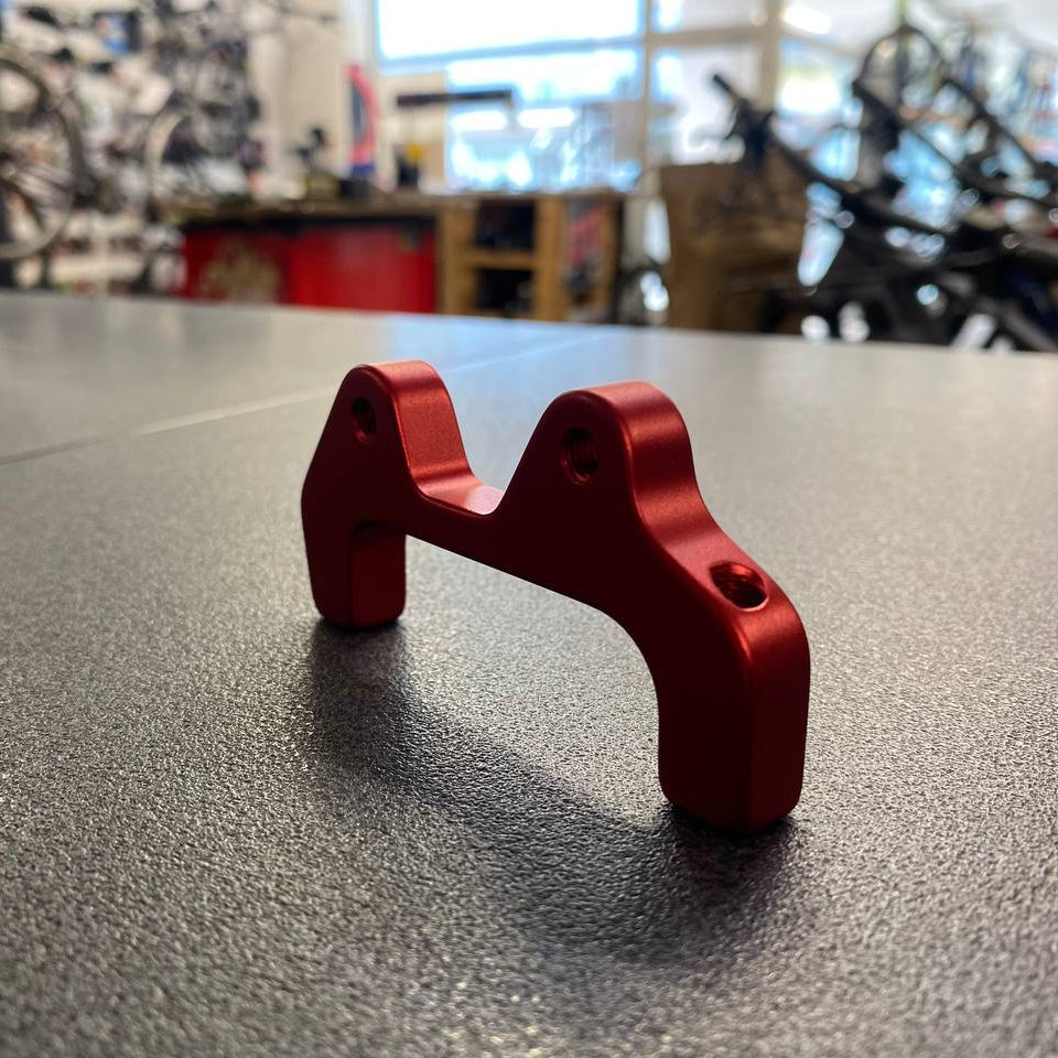Supporto pinza freno posteriore per e-bike Fantic anodizzato rosso